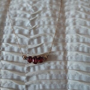 Elegant Gold Necklace with Garnet and Diamond Chips